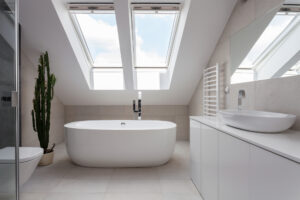 skylight blind in large white bathroom